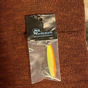 Silver Skalez Fishing Lure in Orange and Yellow